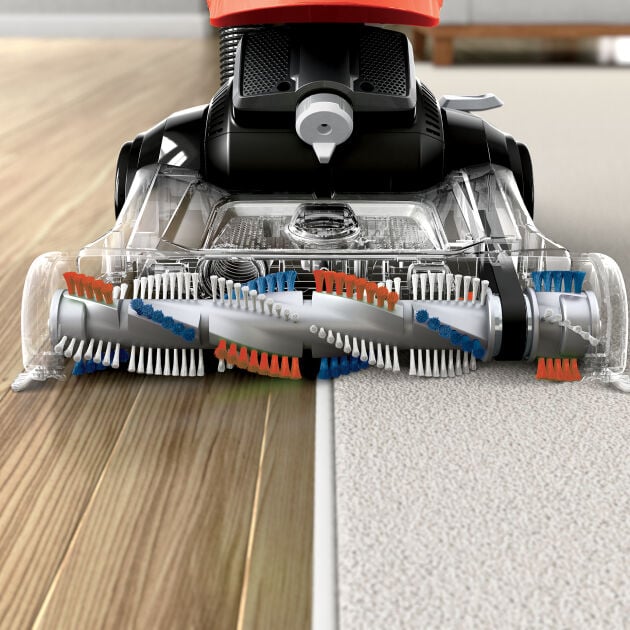 CleanView Swivel Pet Vac Triple Action™ Brush Roll cleaning carpet and hardwood floor simultaneously
