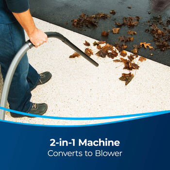 Garage Pro Wet Dry Vac - Blowing Leaves. Text: 2-in-1 Machines Converts to Blower